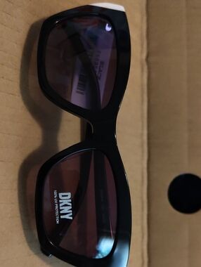 DKNY Black Frame Sunglasses with Smoke Lenses
